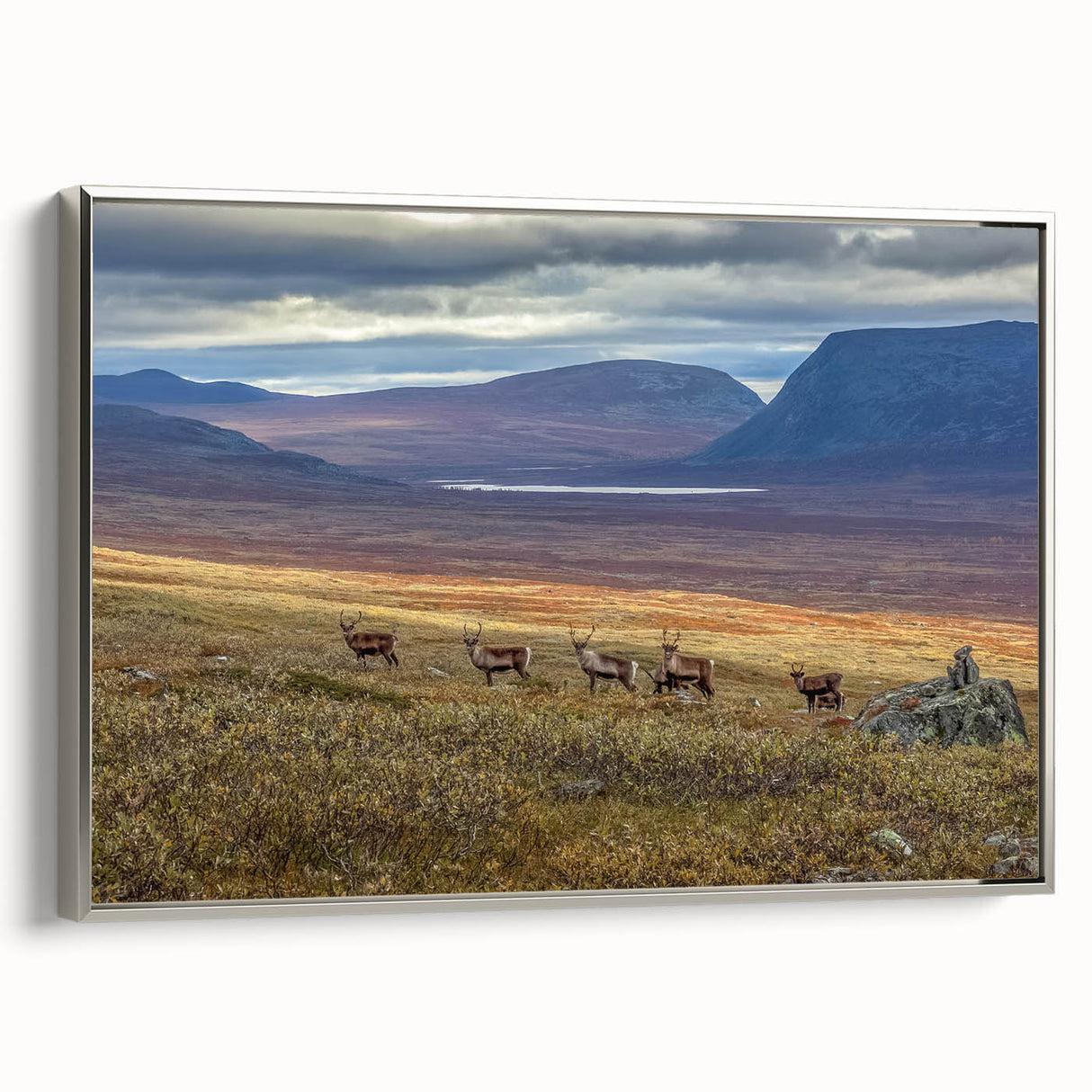Framed canvas of a vintage-style landscape art painting depicting a Swedish scenery in muted earth tones.