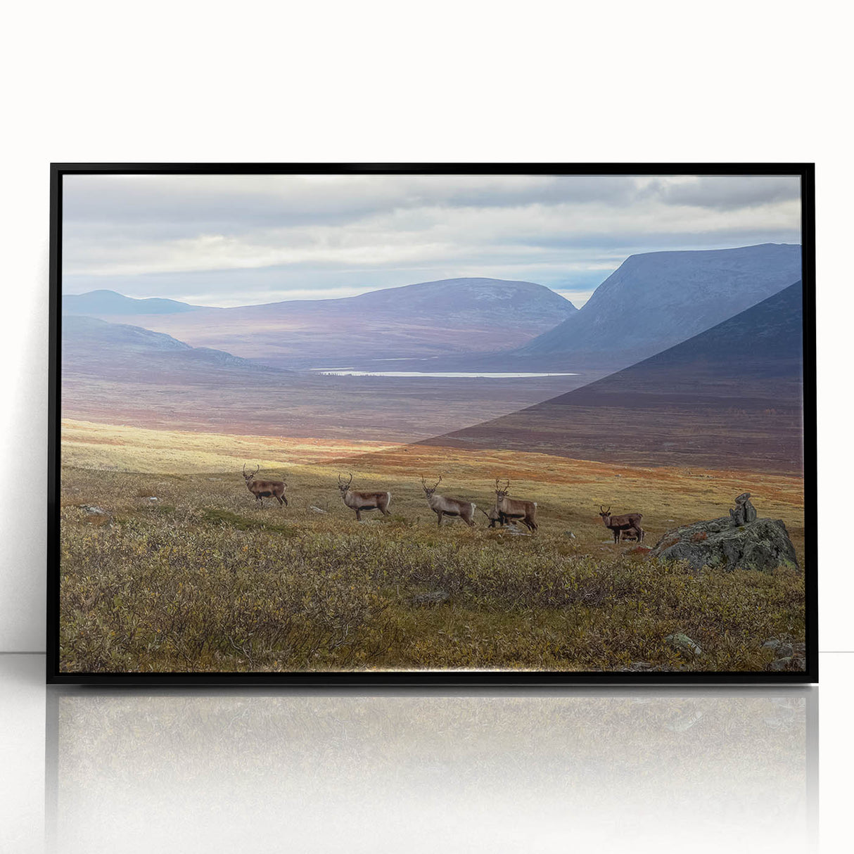 Large abstract wall art depicting a Scandinavian landscape in muted gray and blue tones, framed in black acrylic.