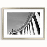 Textured art print of the Vatican scenery in muted earth tones on a framed silver mat, suitable for bedroom decor.
