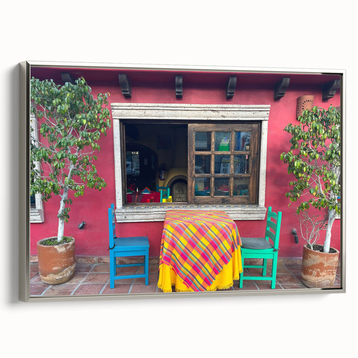 Framed canvas landscape art painting of Cabo San Lucas with colorful and black vintage poster elements.