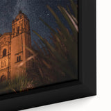 Extra large framed canvas featuring a textured depiction of Oaxaca scenery in black with colorful accents.