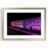 Textured art depicting an abstract scenery of Yucatan, Mexico in muted earth tones, presented in a silver frame with mat.