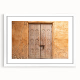 Abstract art print of Dubai skyline in muted blue and gray tones on a white framed canvas, suitable for dining room decor.