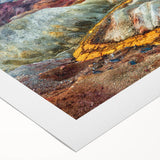Scenic Middle-Eastern landscape on rolled canvas, featuring floral motifs in gentle earth tones.