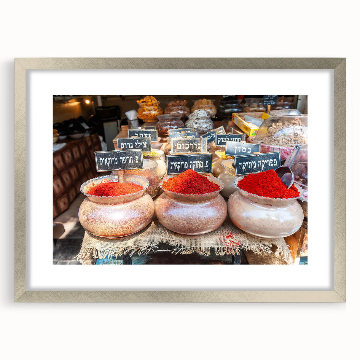 Textured art print of Tel Aviv skyline in muted earth tones on a framed canvas, suitable for bedroom decor.