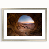 Textured abstract art print featuring a Middle Eastern scenery in muted earth tones, framed in silver.