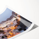 Extra large wall art featuring line art flowers in muted earth tones on a rolled canvas.