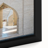 Close-up of a black framed canvas featuring a textured, colorful Middle Eastern scenery, ideal for living room decor.
