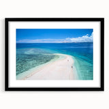 Abstract art print featuring vibrant oceanic blues and greens on a textured canvas, framed in black.