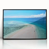 Large abstract wall art depicting an oceanic Fiji scenery in muted blue and green hues, framed in black acrylic.