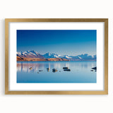 Extra large abstract art print of Oceania, New Zealand scenery in a gold frame, featuring textured shades of blue and green.
