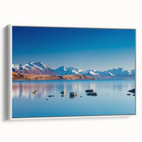 Framed canvas of vintage poster art depicting Canterbury, New Zealand, featuring colorful art in vibrant hues.