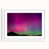 Abstract art print of Otago, New Zealand, in muted blue and green tones on a white-framed canvas.