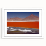 Abstract art print of Bolivia scenery in muted earth tones on a white framed mat, suitable for dining room decor.