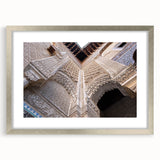 Textured abstract art print of Alabama scenery in muted earth tones, framed in silver, ideal for bedroom decor.