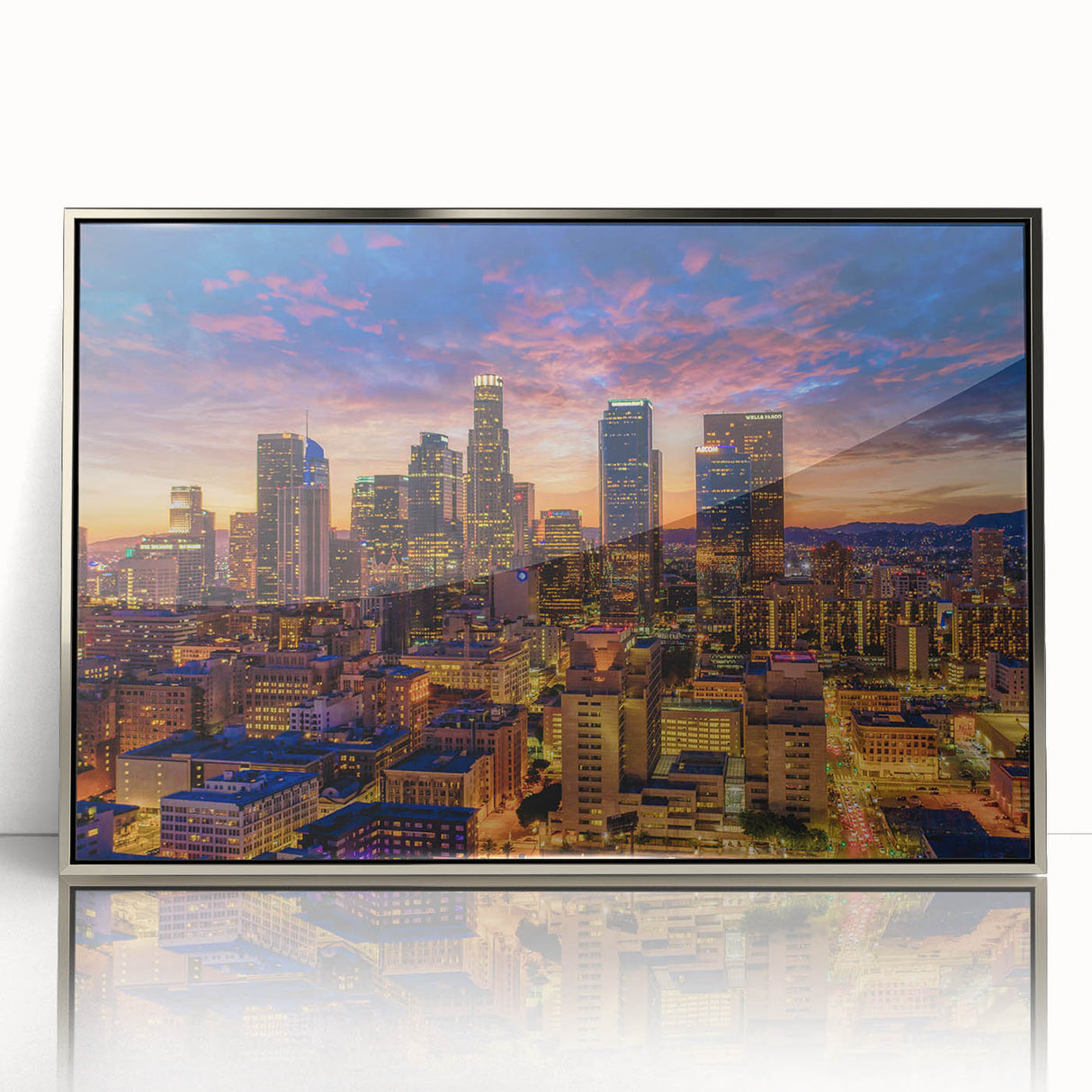 Mid-century modernist art depicting the Los Angeles skyline in muted silver tones on a framed acrylic panel.
