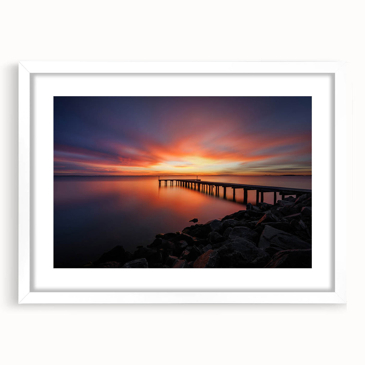 Abstract art print of Delaware scenery in muted earth tones on a framed white mat, suitable for dining room decor.