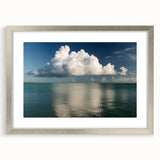 Textured art depicting the Florida Keys in abstract style with soft blue and green hues, framed in silver.