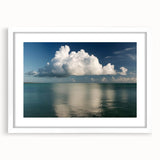 Abstract art print of the Florida Keys in muted blue and green tones on a white-framed canvas.