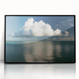 Large abstract wall art depicting the Florida Keys in muted blue and green tones, framed in black acrylic.