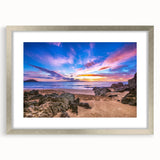 Textured art print of abstract Hawaiian scenery in muted green and blue tones, framed in silver, suitable for bedroom decor.