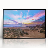 Large abstract wall art depicting Kauai scenery in muted green and blue tones, framed in black acrylic.