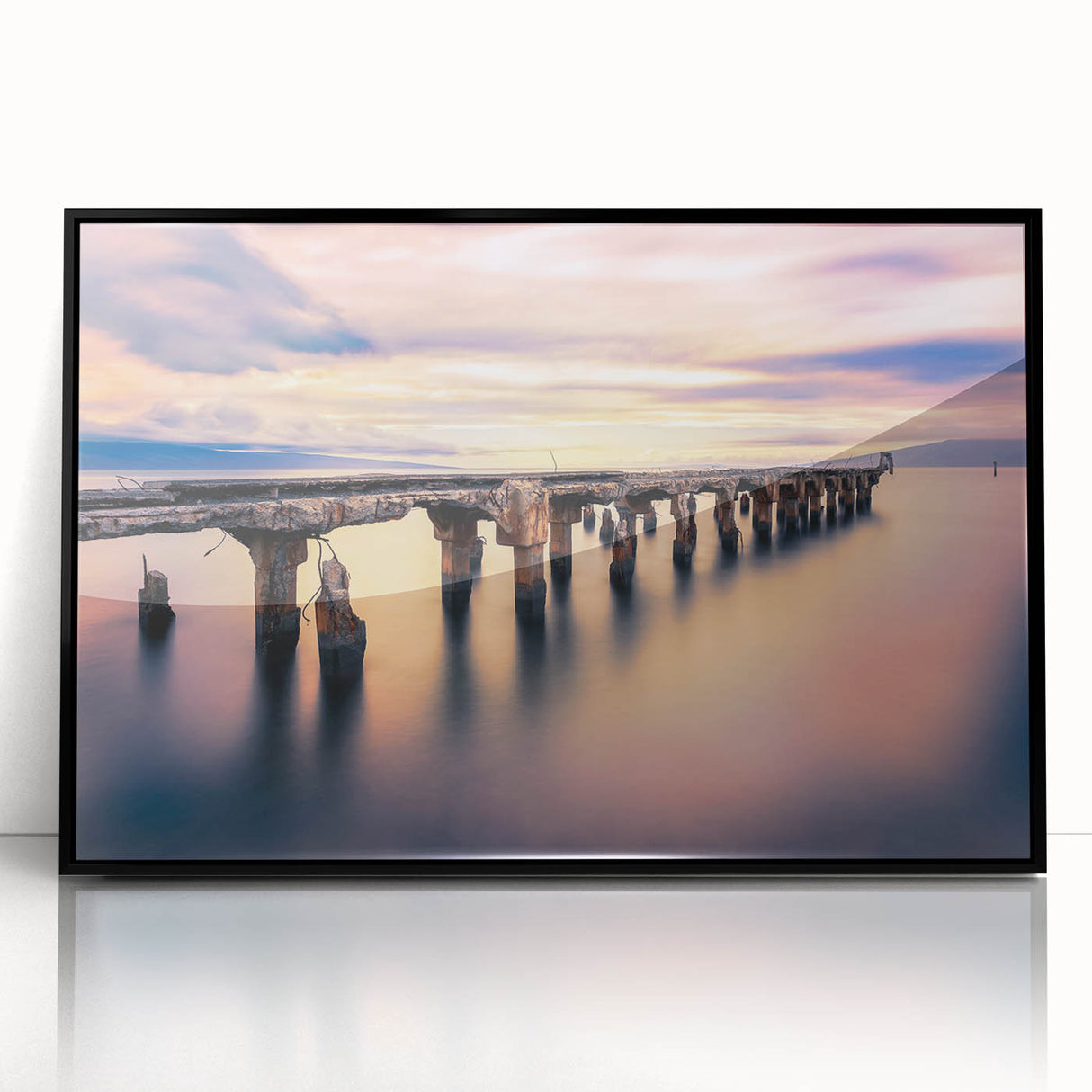 Large abstract wall art depicting the Maui coastline in vibrant blues and greens, framed in black acrylic.
