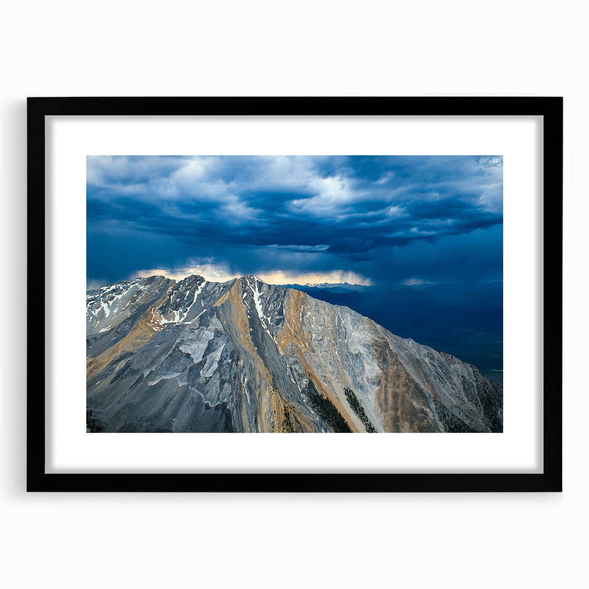 Extra large abstract art print of colorful, textured Idaho scenery on a black framed canvas, ideal for living room decor.