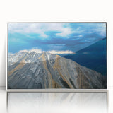 Art deco poster of Idaho scenery in muted gray and blue tones, acrylic print framed in white.