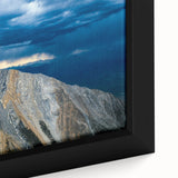 Extra large framed canvas depicting a textured Idaho scenery in black with colorful art accents.
