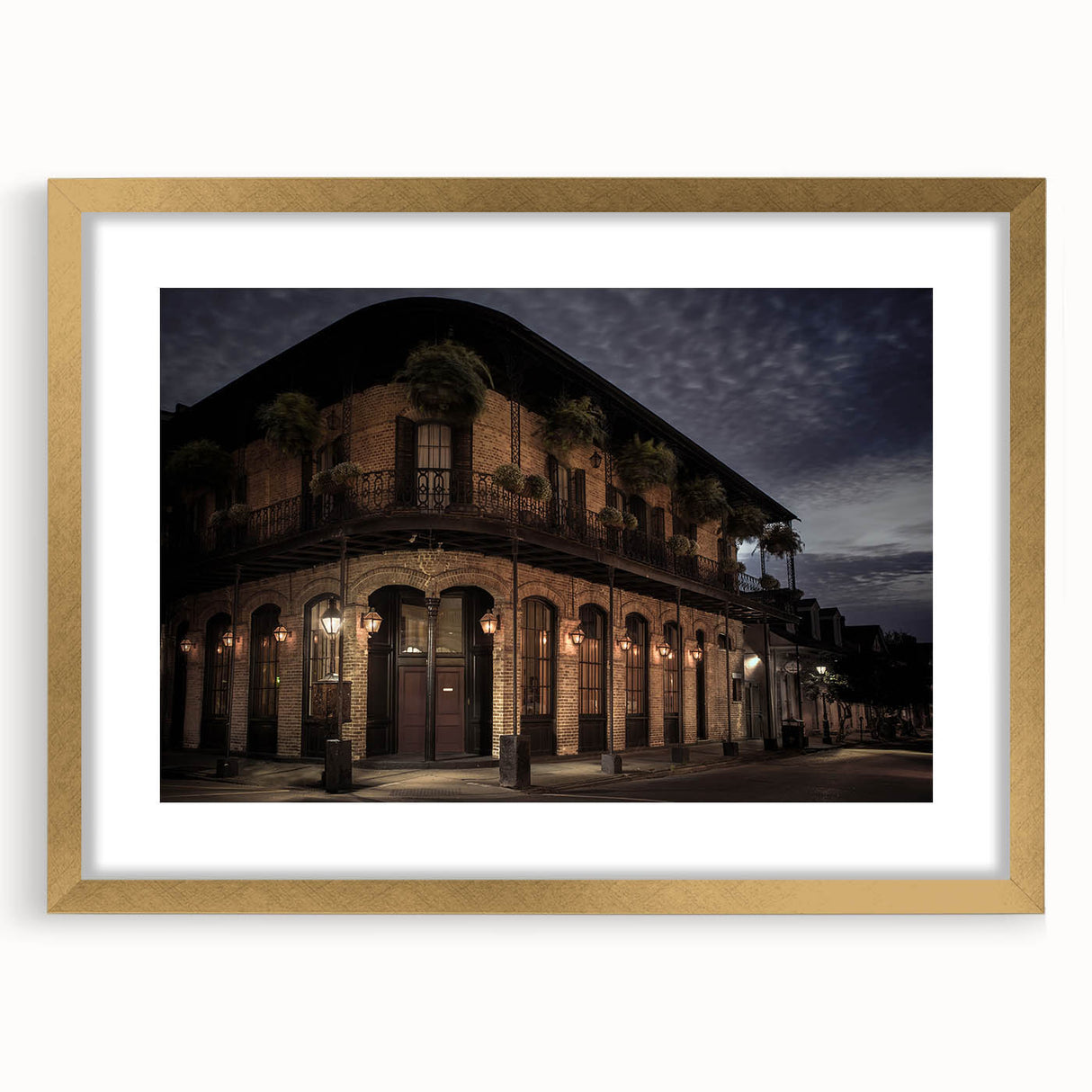 Abstract art print of New Orleans scenery in textured hues of gold and blue on a large framed canvas.