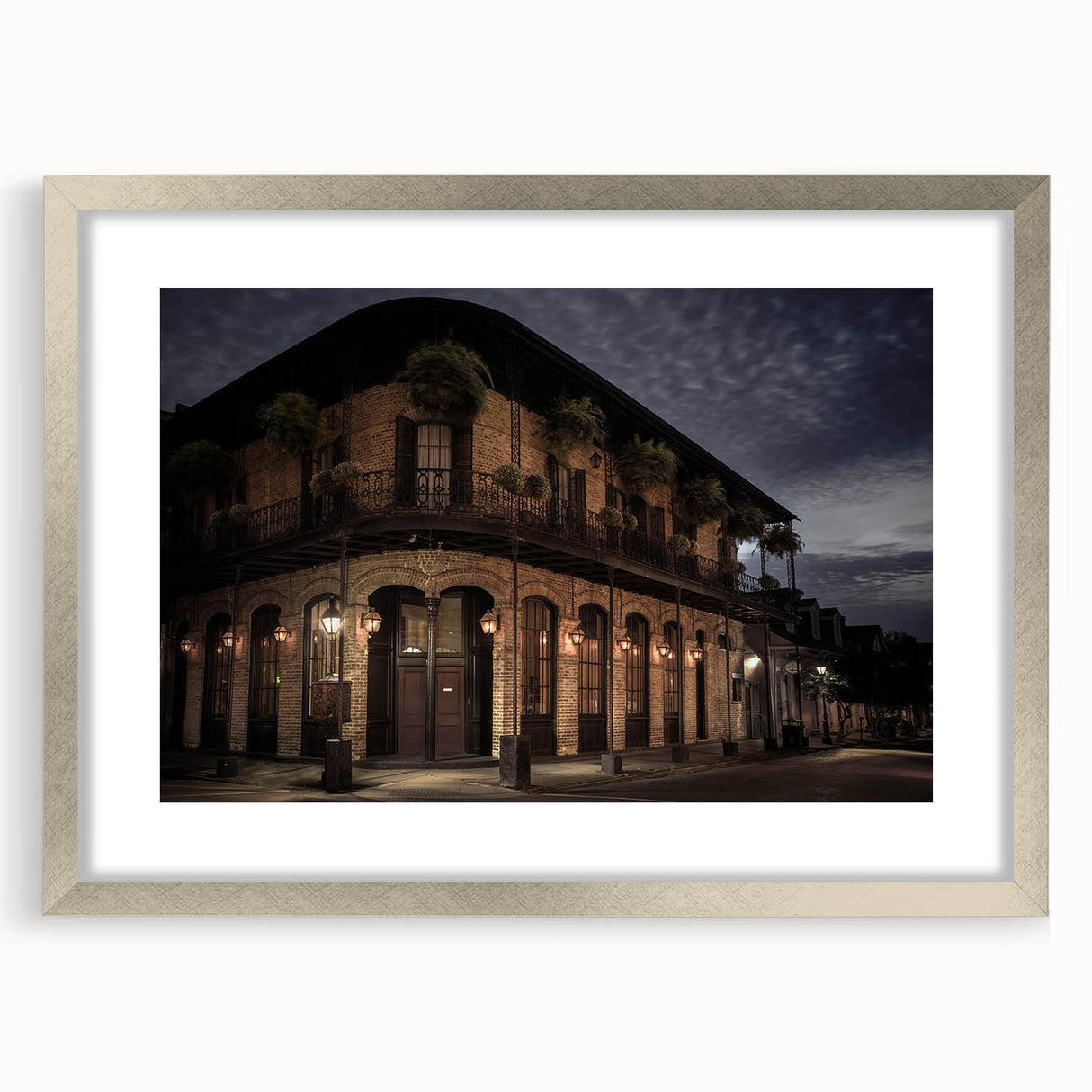 Textured art of abstract New Orleans scenery in muted earth tones on framed silver mat, suitable for bedroom decor.