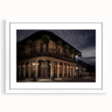 Abstract art print featuring a colorful depiction of the New Orleans skyline on a white framed canvas.