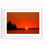 Abstract art print depicting a serene Maine landscape in muted blue and green tones, framed with a white mat.