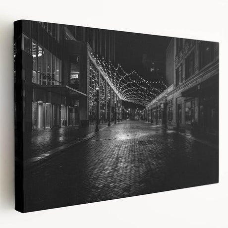Side view of a stretched canvas depicting a serene Detroit skyline in muted blue and gray tones.
