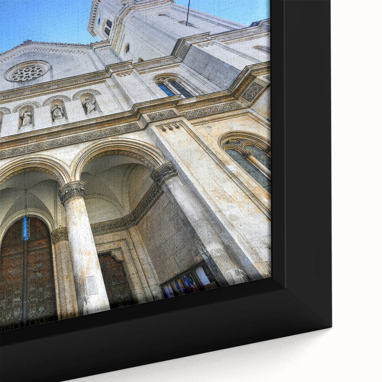 Framed canvas of the St. Louis skyline in black with colorful, textured detailing, ideal for living room decor.