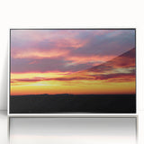Acrylic print of Charlotte, North Carolina skyline in muted colors, framed in white, suitable for modern art wall decor.