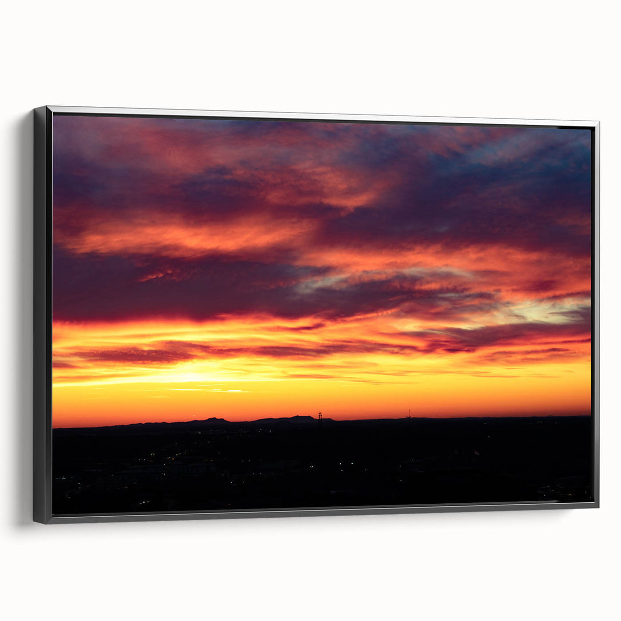 Black and white framed canvas of Charlotte, North Carolina skyline, ideal for bedroom wall art.