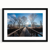 Extra large wall art featuring an abstract representation of a Vermont landscape in vibrant colors, framed in black.