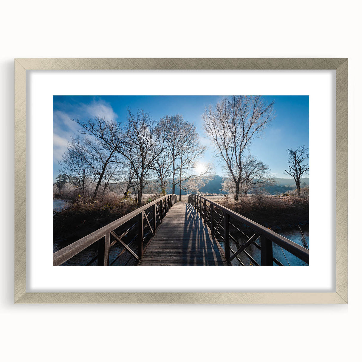Textured art depicting an abstract Vermont landscape in muted earth tones, framed with a silver mat, ideal for bedroom art.