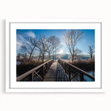 Abstract art print of a Vermont landscape in muted green and blue tones, framed with a white mat.