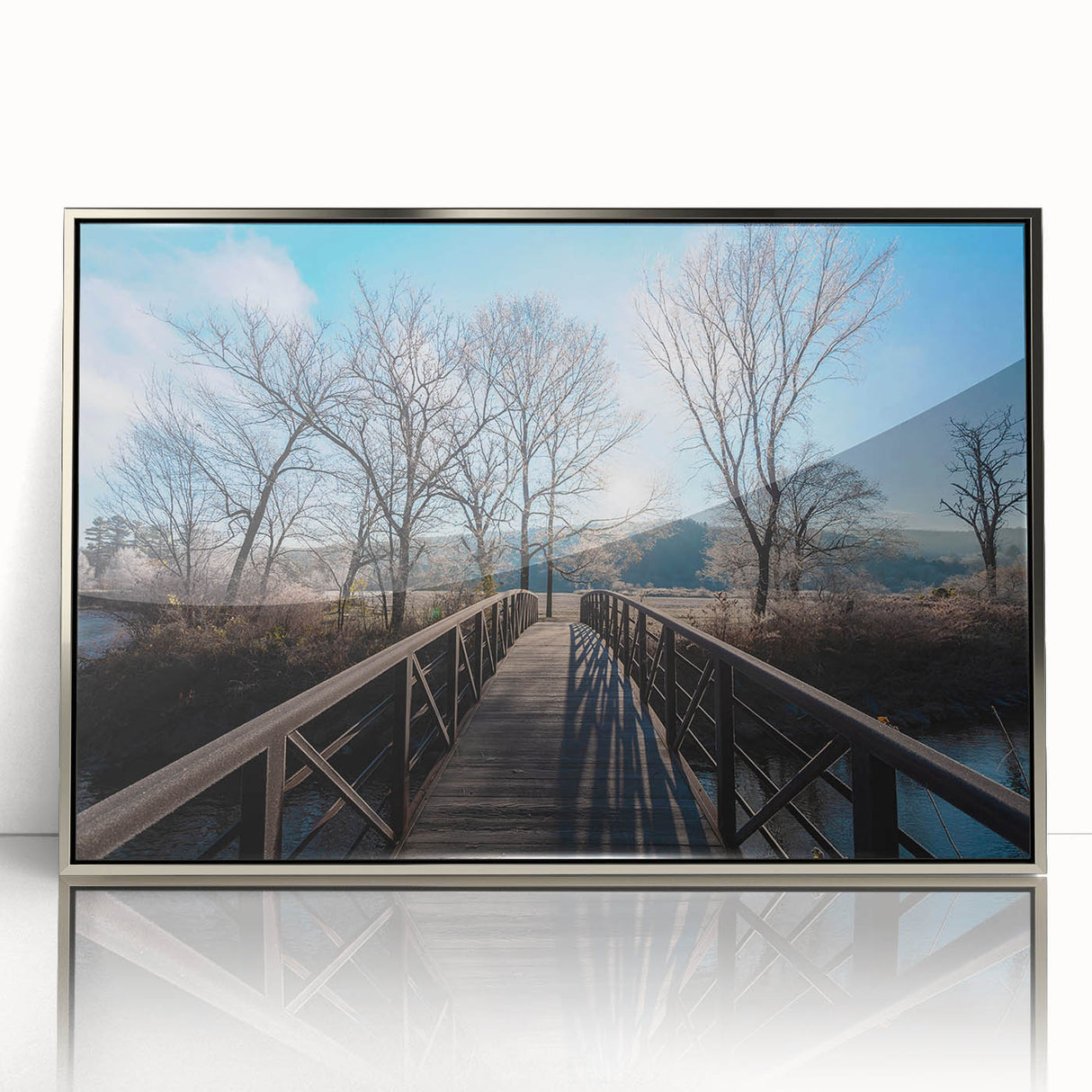 Mid-century modernist art of Vermont landscape in silver framed acrylic, featuring muted earth tones.