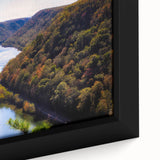 Framed canvas featuring a textured depiction of West Virginia scenery in black with colorful accents.