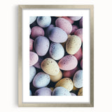 Abstract textured art print depicting spring themes in soft green and white, framed in silver, suitable for bedroom decor.