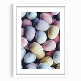 Abstract art print depicting spring with soft pastel shades on a white framed canvas.