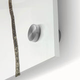 Large abstract wall art in vibrant orange and blue tones on acrylic glass.