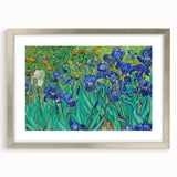 Textured abstract art print in silver frame, featuring swirling blue and yellow tones, ideal for bedroom wall decor.