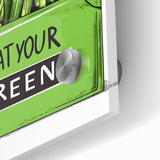 Close-up of large abstract wall art featuring assorted fruits in vibrant colors on acrylic glass.