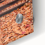 Large abstract wall art in warm autumn hues on acrylic glass, ideal for dining room art in a mid-century modernist style.