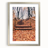 Textured abstract art print in earthy orange and brown tones, framed in silver, ideal for bedroom art.